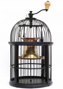 I know why the caged bird sings. | Metal wire, wood, brass, razor blades. | 19x19x39cm.